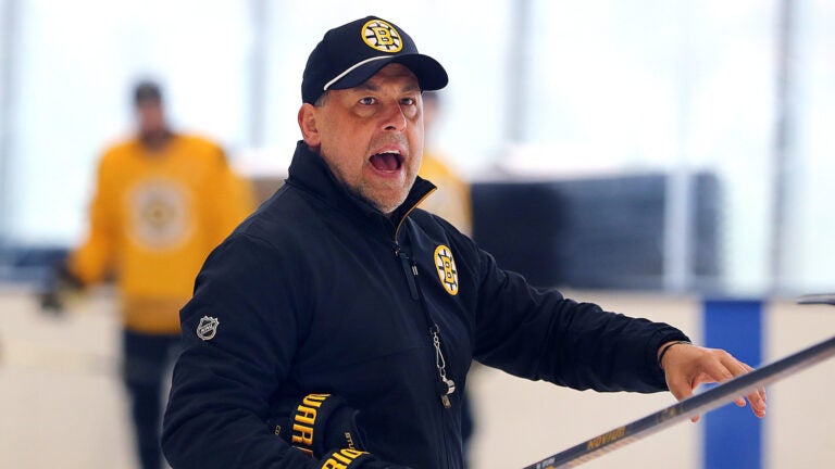 The Boston Bruins held practice at the Warrior Ice Arena on Wednesday. Coach Marco Sturm yells instructions.