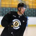 The Boston Bruins held a captain’s practice at Warrior Arena oin Thursday morning. Jordan Harris skates in warmups.