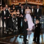Paul Thomas Anderson, left center, Sara Murphy, right center, and the team from "One Battle After Another" accept the award for best picture during the Oscars on Sunday, March 15, 2026, at the Dolby Theatre in Los Angeles.