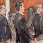 Alon Alexander, Oren Alexander, and Tal Alexander, watch the jury file out of the courtroom.