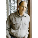 Author Tracy Kidder stands in his cottage, in South Bristol, Maine.