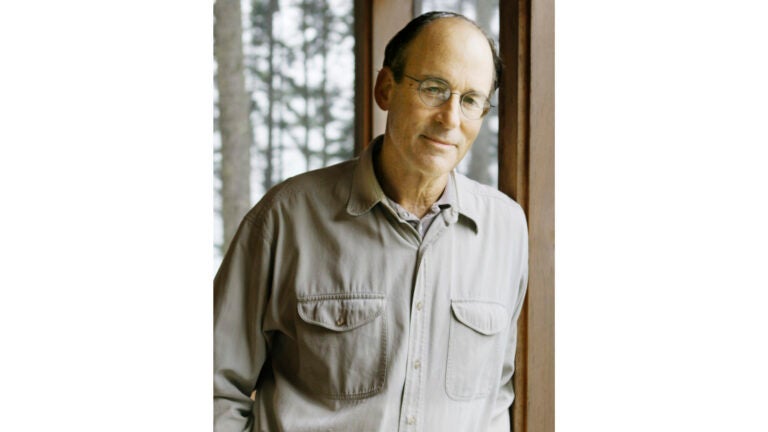 Author Tracy Kidder stands in his cottage, in South Bristol, Maine.