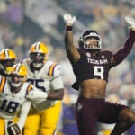 Texas A&M defensive end Cashius Howell (9) celebrates his sack of LSU quarterback Garrett Nussmeier (18) in the first half of an NCAA college football game, Saturday, Oct. 25, 2025 in Baton Rouge, La.