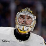 Boston Bruins goaltender Jeremy Swayman (1) reacts in the second period of an NHL hockey game against the New York Islanders, Wednesday, Nov. 26, 2025, in Elmont, N.Y.