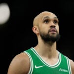 Boston Celtics' Derrick White pauses before shooting a free throw during an NBA basketball game against the Milwaukee Bucks, Monday, March 2, 2026, in Milwaukee.