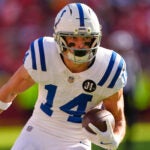 Indianapolis Colts wide receiver Alec Pierce runs the ball during the second half of an NFL football game against the Kansas City Chiefs, Sunday, Nov. 23, 2025, in Kansas City, Mo.