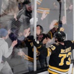 Boston Bruins defenseman Charlie McAvoy celebrates with fans after scoring the game-winning goal off Los Angeles Kings goaltender Darcy Kuemper during an overtime period of an NHL hockey game, Tuesday, March 10, 2026, in Boston. (AP PhotoBoston Bruins defenseman Charlie McAvoy celebrates with fans after scoring the game-winning goal off Los Angeles Kings goaltender Darcy Kuemper during an overtime period of an NHL hockey game, Tuesday, March 10, 2026, in Boston.