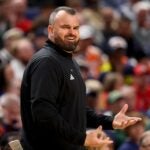 BUFFALO, NEW YORK - MARCH 19: Head coach Bryan Hodgson of the South Florida Bulls reacts against the Louisville Cardinals during the first half in the first round of the 2026 NCAA Men's Basketball Tournament at KeyBank Center on March 19, 2026 in Buffalo, New York.