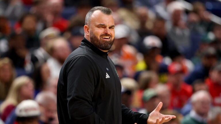 BUFFALO, NEW YORK - MARCH 19: Head coach Bryan Hodgson of the South Florida Bulls reacts against the Louisville Cardinals during the first half in the first round of the 2026 NCAA Men's Basketball Tournament at KeyBank Center on March 19, 2026 in Buffalo, New York.