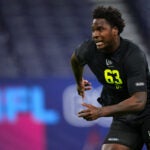 Missouri defensive lineman Zion Young (63) runs a drill at the NFL football scouting combine in Indianapolis, Thursday, Feb. 26, 2026.