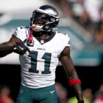 Philadelphia Eagles wide receiver A.J. Brown (11) celebrates after scoring during the second half of an NFL football game against the Los Angeles Rams Sunday, Sept. 21, 2025, in Philadelphia.