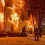 Firefighters battle a blaze on Granite Street.