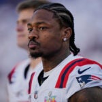 New England Patriots wide receiver Stefon Diggs (8) stands on the sidelines before taking on the Seattle Seahawks in the NFL Super Bowl 60 football game, Sunday, Feb. 8, 2026 in Santa Clara, Calif.
