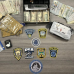 The two men were arrested for allegedly trafficking over 200 grams of cocaine.