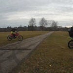 Police shared surveillance images depicting the two riders and their dirt bikes.