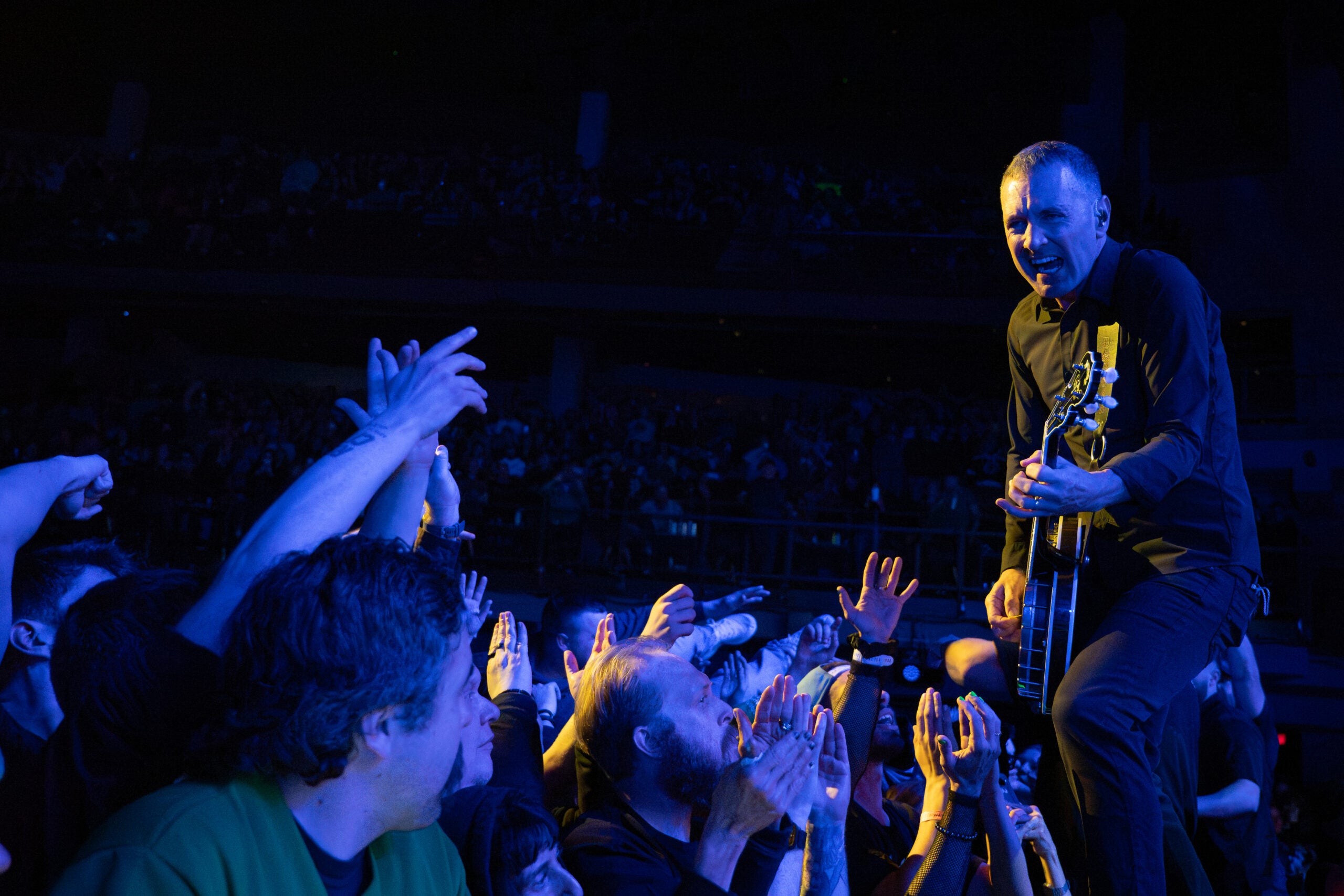 DaRosa runs along the stage extensions in front of the crowd Friday night.