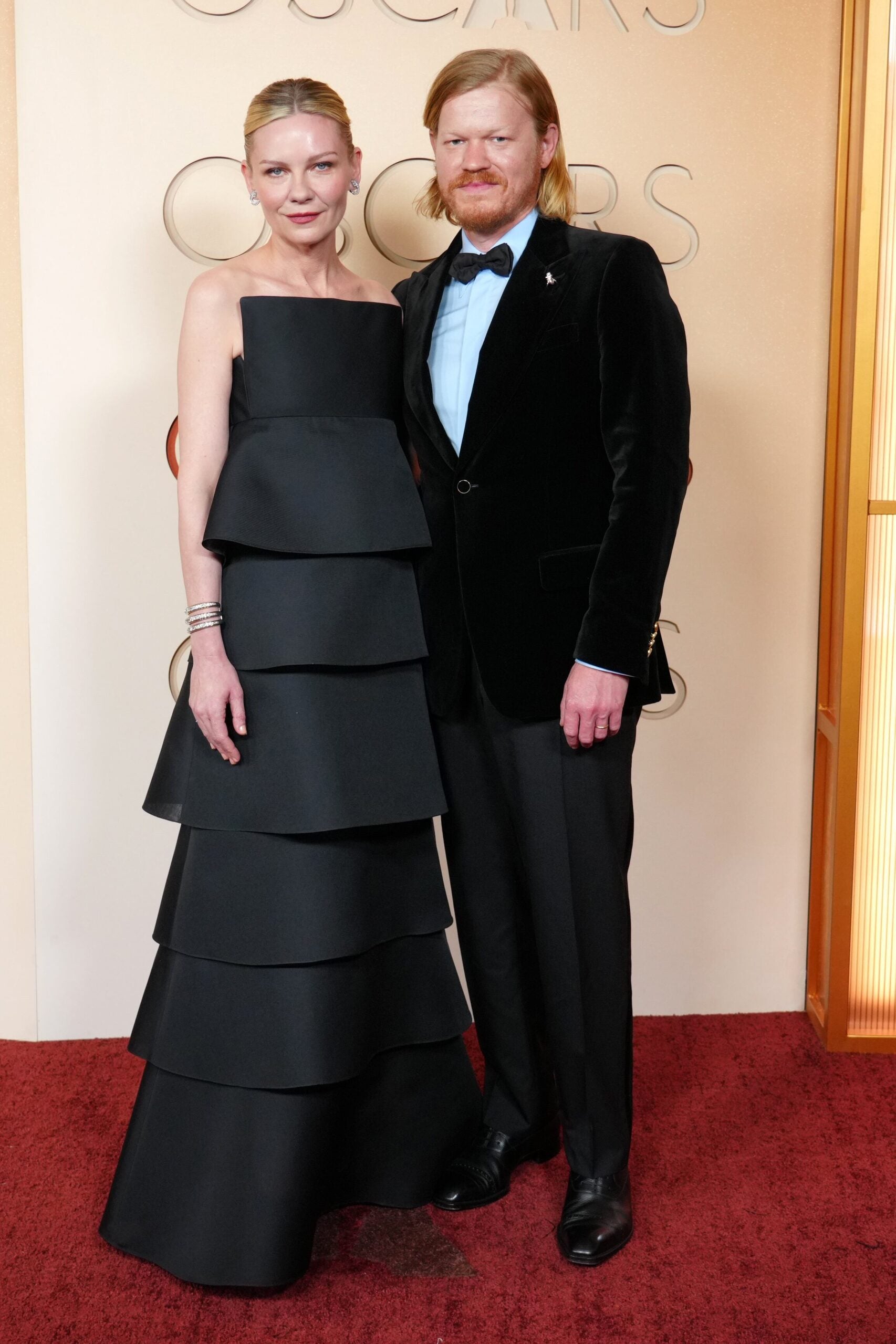 Kirsten Dunst, left, and Jesse Plemons arrive at the Oscars on Sunday, March 15, 2026, at the Dolby Theatre in Los Angeles.