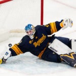 Warriors goaltender Max Lundgren (47) bakes a highlight save on this scoring opportunity by UMass Minutemen forward Jack Musa (9) late in the second period. The UMass Minutemen play the Merrimack Warriors in a Hockey East semi-final game Friday, March 20, 2026 at TD Garden in Boston, MA.