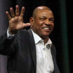 Boston Celtics head coach receiving the basketball award during the Tradition sports awards program at TD Garden.