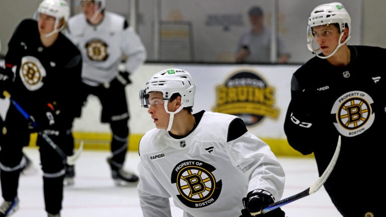Bruins development camp at Warrior Arena in Boston on July 3, 2025, Boston Bruins draft picks James Hagens ( in center white helmet and jersey ).