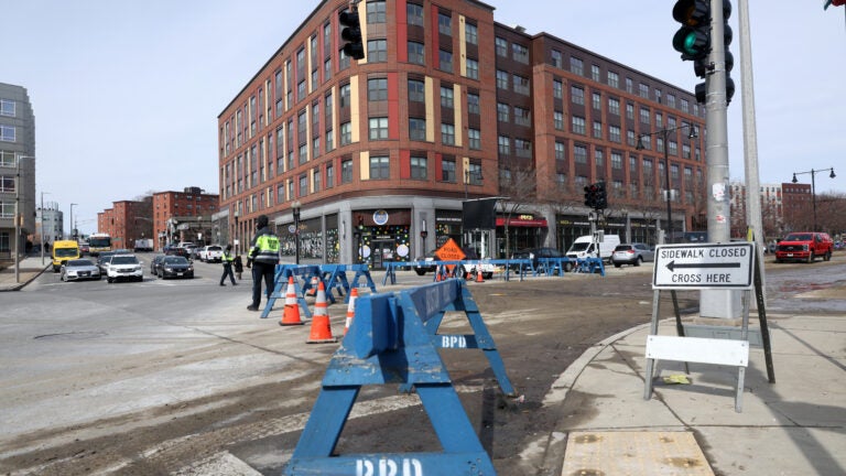 Roadways at the Jackson Square intersection had to be restored after a water main break caused extensive flooding.