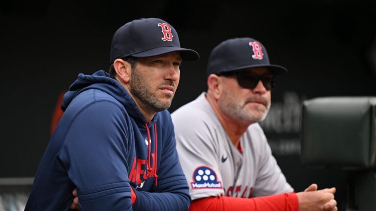 BALTIMORE, MD - APRIL 26: Interim Manager Chad Tracy of the Boston Red Sox, left and Interim Third Base Coach Chad Epperson #81 look out over the field before their game against the Baltimore Orioles at Oriole Park at Camden Yards on April 26, 2026 in Baltimore, Maryland.