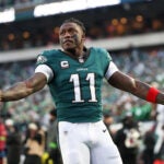 Philadelphia Eagles wide receiver A.J. Brown (11) gestures towards the crowd during pre-game warm-ups before an NFL wild card playoff football game against the San Francisco 49ers, Sunday, Jan. 11, 2026, in Philadelphia.
