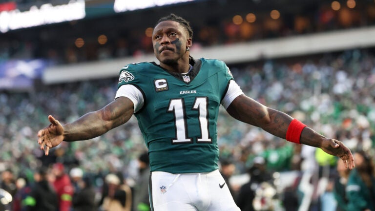 Philadelphia Eagles wide receiver A.J. Brown (11) gestures towards the crowd during pre-game warm-ups before an NFL wild card playoff football game against the San Francisco 49ers, Sunday, Jan. 11, 2026, in Philadelphia.