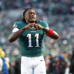 Philadelphia Eagles wide receiver A.J. Brown (11) gestures towards the crowd during pre-game warm-ups before an NFL wild card playoff football game against the San Francisco 49ers, Sunday, Jan. 11, 2026, in Philadelphia.