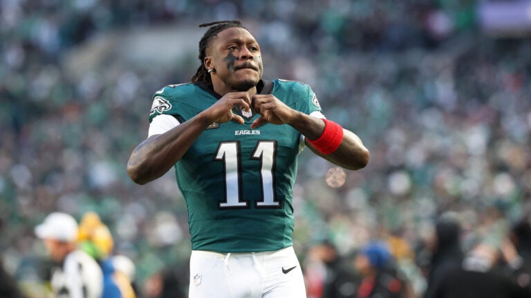 Philadelphia Eagles wide receiver A.J. Brown (11) gestures towards the crowd during pre-game warm-ups before an NFL wild card playoff football game against the San Francisco 49ers, Sunday, Jan. 11, 2026, in Philadelphia.
