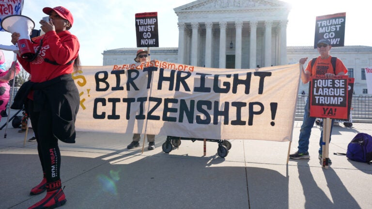 Pro and anti-Trump demonstrators rally outside the U.S. Supreme Court.
