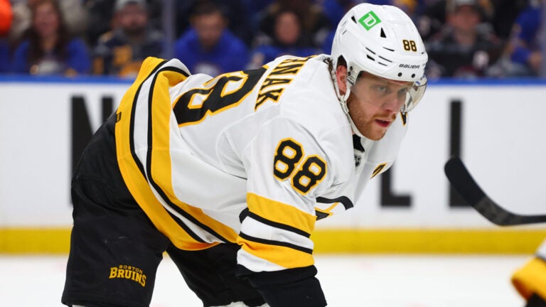 Boston Bruins right wing David Pastrnak (88) lines up for a faceoff during the second period in Game 1 of a first-round NHL hockey Stanley Cup playoff series against the Buffalo Sabres Sunday, April 19, 2026, in Buffalo, N.Y.