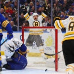 Boston Bruins left wing Viktor Arvidsson (71) ,center, celebrates his goal during the second period of an NHL hockey game against the Buffalo Sabres Wednesday, March 25, 2026, in Buffalo, N.Y.
