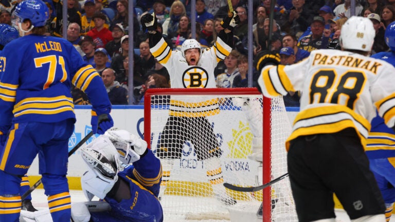 Boston Bruins left wing Viktor Arvidsson (71) ,center, celebrates his goal during the second period of an NHL hockey game against the Buffalo Sabres Wednesday, March 25, 2026, in Buffalo, N.Y.