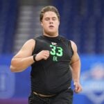 Caleb Lomu Patriots phone call draft night