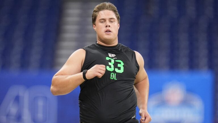 Caleb Lomu Patriots phone call draft night