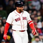 BOSTON, MASSACHUSETTS - APRIL 06: Willson Contreras #40 of the Boston Red Sox reacts after getting hit by a pitch during the third inning against the Milwaukee Brewers at Fenway Park on April 06, 2026 in Boston, Massachusetts.