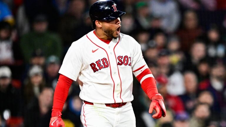 BOSTON, MASSACHUSETTS - APRIL 06: Willson Contreras #40 of the Boston Red Sox reacts after getting hit by a pitch during the third inning against the Milwaukee Brewers at Fenway Park on April 06, 2026 in Boston, Massachusetts.