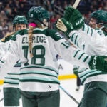 Boston Fleet's Shay Maloney (left), Jessie Eldridge (18) and Sophie Shirley (9) celebrate a goal against the Vancouver Goldeneyes during second period PWHL hockey action in Edmonton on Tuesday, April 7, 2026.