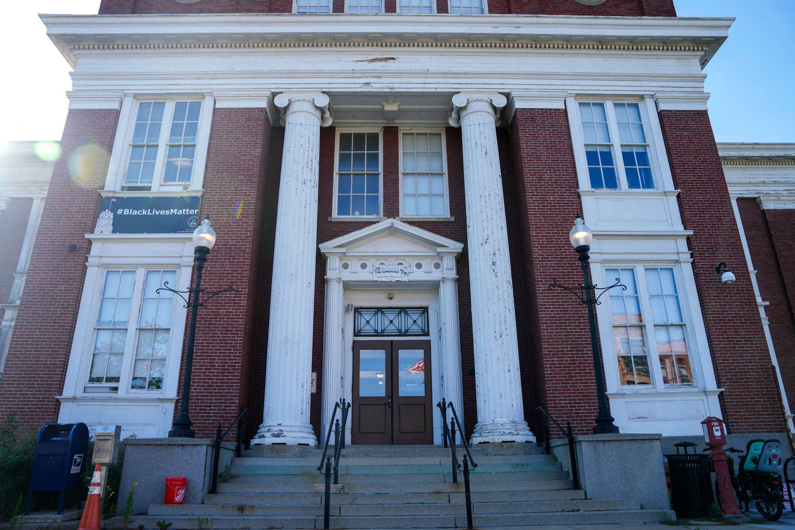 boston.com - Molly Farrar - Somerville has been trying to fire a police detective since 2018. He's still getting paid.