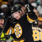 Boston Bruins center Morgan Geekie (39) celebrates his goal during the second period of an NHL hockey game against the Tampa Bay Lightning, Saturday, April 11, 2026, in Boston.
