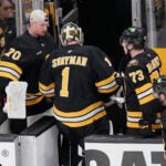 Boston Bruins goaltender Jeremy Swayman (1) heads to the locker room following a loss to the Buffalo Sabres in Game 3 of a first-round NHL hockey Stanley Cup playoff series, Thursday, April 23, 2026, in Boston.