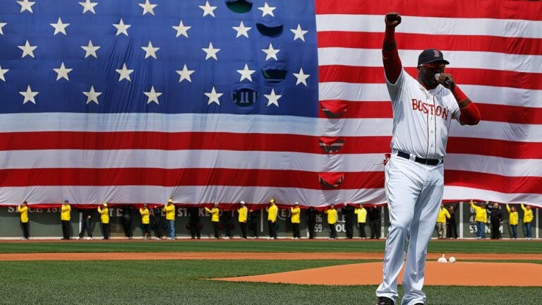BOSTON, MA - APRIL 20: David Ortiz #34 of the Boston Red Sox speaks during a pre-game ceremony in honor of the bombings of Marathon Monday before a game at Fenway Park on April 20, 2013 in Boston, Massachusetts.