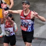 Zdeno Chara crosses the Finish Line of the Boston Marathon in 2023.