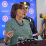 The 26-year-old man was fatally shot after allegedly approaching officers with a knife, according to Middlesex DA Marian Ryan.