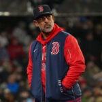 Boston Red Sox Manager Alex Cora during the 6th inning). The Boston Red Sox host the Milwaukee Brewers on Tuesday, April 7, 2026 at Fenway Park in Boston, MA.