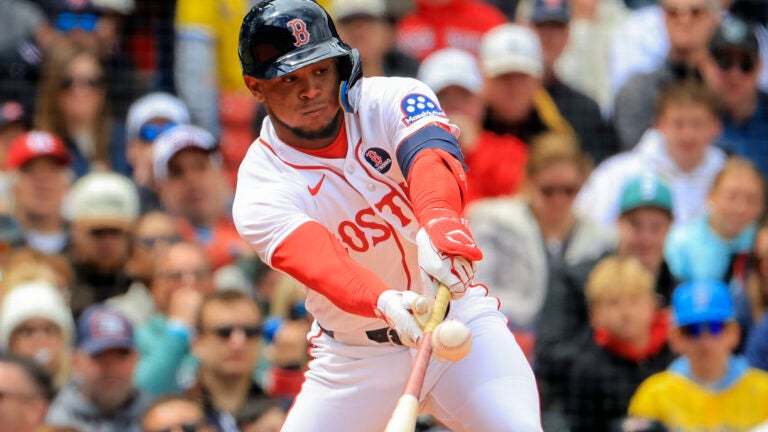 A 4/20/26 Boston Red Sox outfielder Ceddanne Rafaela (3) hits a 2 RBI single and advanced to second base on the throw to the plate against the Detroit Tigers during seventh inning MLB action at Fenway Park on Monday April 20, 2026.