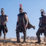 L to R: Jimmy Gonzales as Cepheus, Matt Damon as Odysseus and Himesh Patel as Eurylochus in a scene from "The Odyssey."