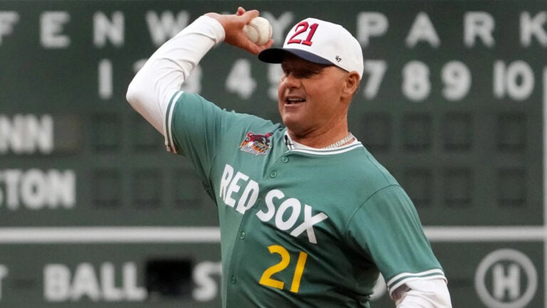 Roger Clemens throws out first pitch at Fenway Park to son Kody Roger Clemens throws out first pitch at Fenway Park to son Kody