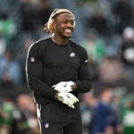 Philadelphia Eagles wide receiver A.J. Brown looks on during pre-game warm-ups before an NFL wild card playoff football game against the San Francisco 49ers, Sunday, Jan. 11, 2026, in Philadelphia. (